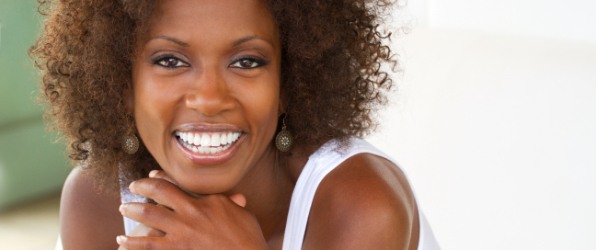 Woman with healthy smile thanks to preventive dentistry