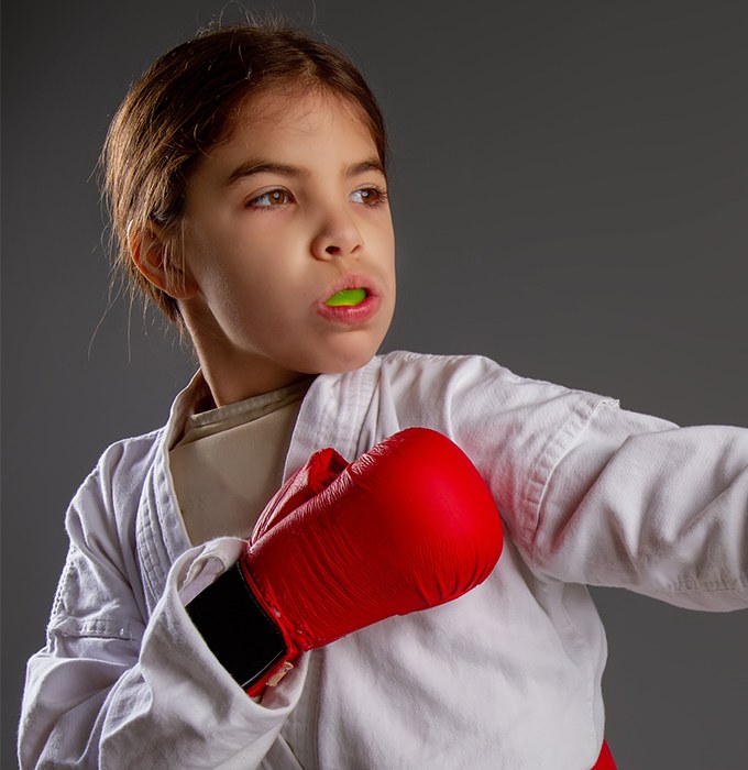 Teen girl with athletic mouthguard