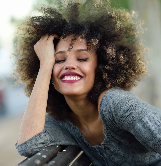 Woman with gorgeous smile after gum recontouring