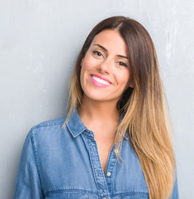 Portrait of young woman with nice smile