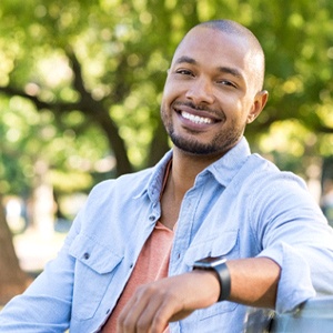 man enjoying his new teeth