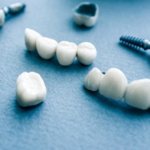 Series of dental restorations resting on a table