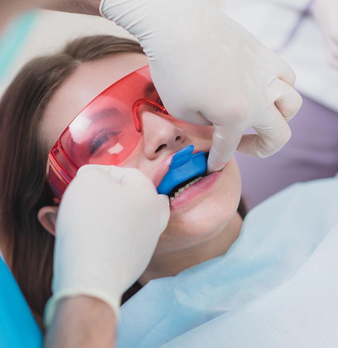 Patient receiving fluoride treatment