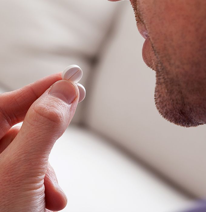 Patient taking oral conscious dental sedation pill