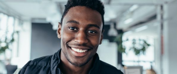 Man with healthy smile after gum disease treatment