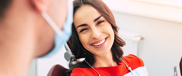 Relaxed patient smiling during sedation dentistry visit