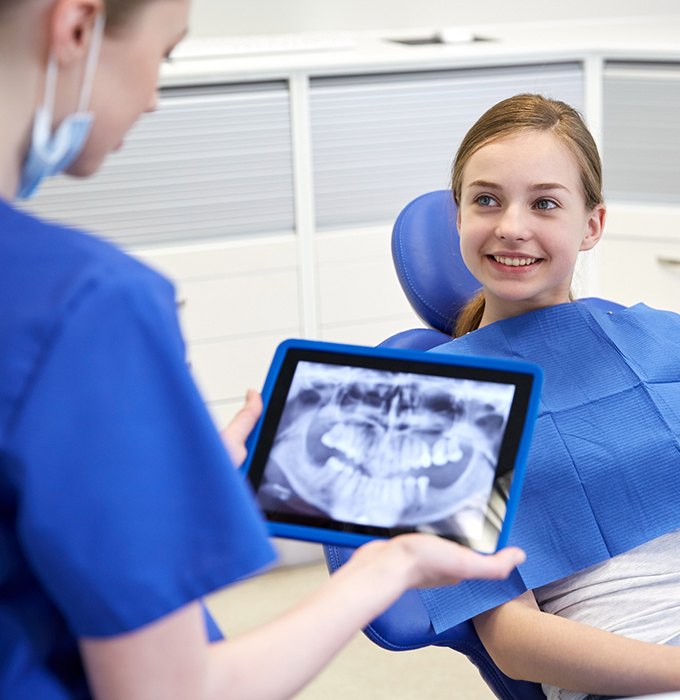 Dentist reviewing patient's digital x-rays